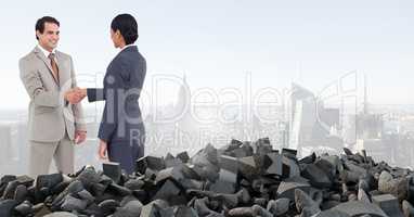 Broken concrete pile and business people in cityscape