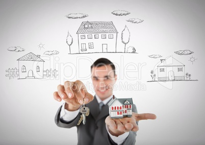Man Holding key with houses icons and house in front of vignette