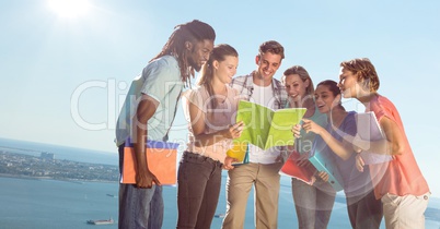 College students against blurry slanted coastline