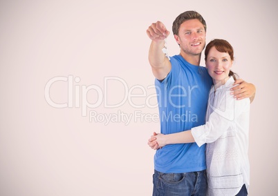 Couple Holding key in front of vignette