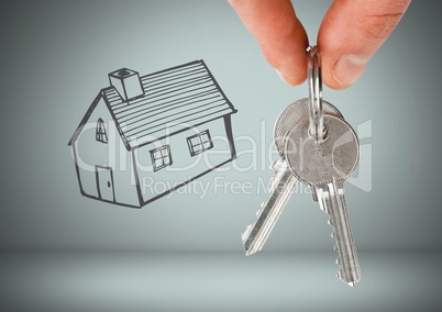 Hand Holding key with house drawing in front of vignette