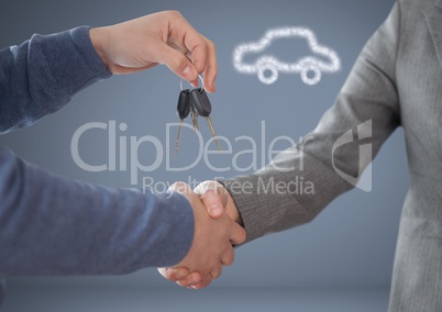 Hands Holding key in front of vignette with handshake with car