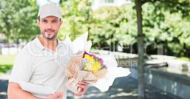 Delivery man with flowers against blurry campus