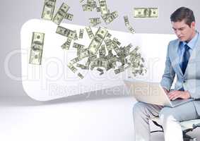 texting money. young businessman sit with laptop. Money coming up from laptop.