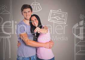 Couple Holding key with home room drawings in front of vignette