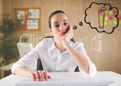 Bored business woman at desk dreaming of cocktail against blurry office