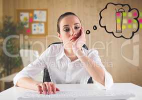 Bored business woman at desk dreaming of cocktail against blurry office