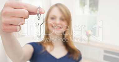 Woman Holding key in home