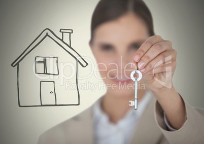 Woman Holding key with house drawing in front of vignette