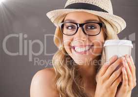 Close up of millennial woman smiling with coffee and flare against brown background