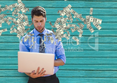 texting money. young businessman with laptop. Money coming up from laptop.