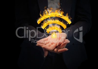 hands with WIFI fire icon between. Black background