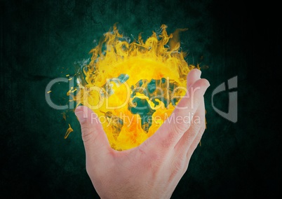 hand taking the earth fire icon. Green and black background