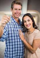 Couple Holding key  in home