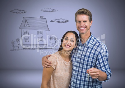 Couple Holding key with house drawing in front of vignette