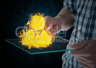 hands with device with contact fire icon over. Blue and black wall background