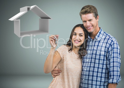 Couple Holding key with house icon in front of vignette