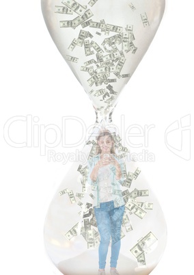 texting money. Woman with phone inside a hourglass with money