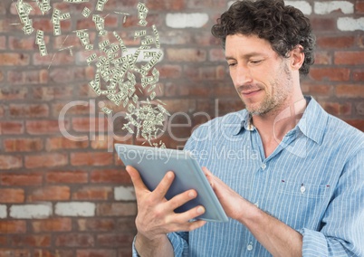 texting money. man with tablet. Money coming up from tablet.