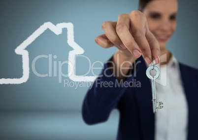 Woman Holding key with house icon in front of vignette