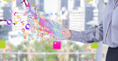 woman with hand spread of  with application icons with pink and blue lights coming up form it. Blurr