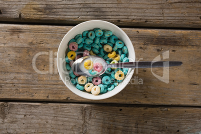 Bowl of froot loops with spoon