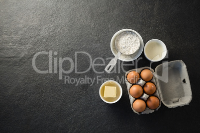 Overhead view of ingredient by egg carton