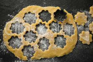 Close up of flower shape mould on dough