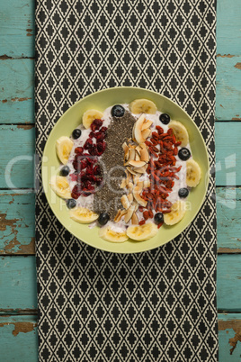 Fruit cereal in plate on a napkin cloth