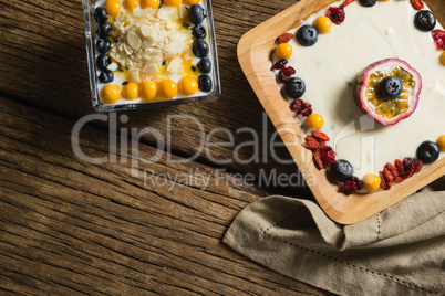 Various fruit cereals on a wooden table