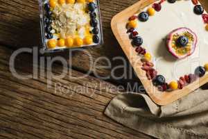 Various fruit cereals on a wooden table