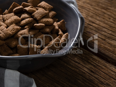 Bowl of chocolate toast crunch with napkin