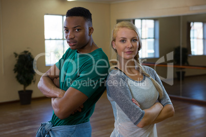 Portrait of confident dancers in studio