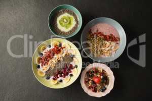 Various fruit cereals on concrete background