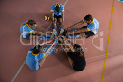 High angle view of volleyball players warming up