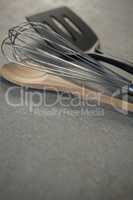 Wooden spoon with wire whisk and spatula