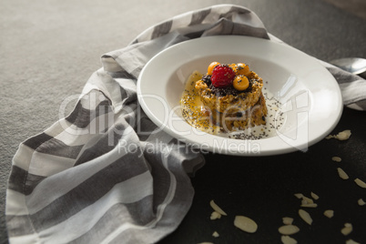Plate of breakfast cereals with fruits