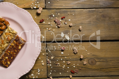 Three dry fruits bars arranged in plate