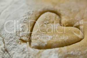 Close up of heart shape on dough