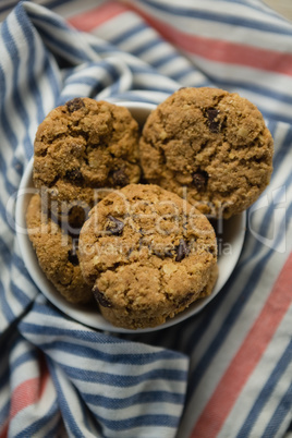 Close up of cookies in bowl on napkin
