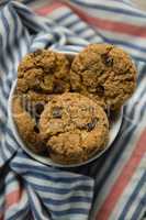 Close up of cookies in bowl on napkin