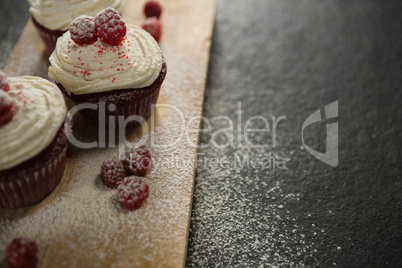 Close up of cupcakes on cutting board