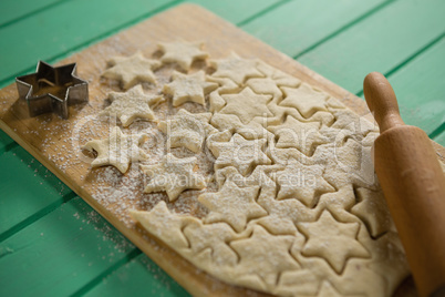 Close up of star shape cookies on cutting board
