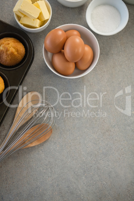 Overhead view of ingredients by muffin tin