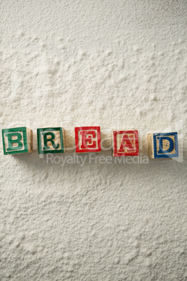 Bread text made with blocks on flour
