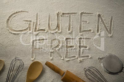 Gluten free text on flour with utensils