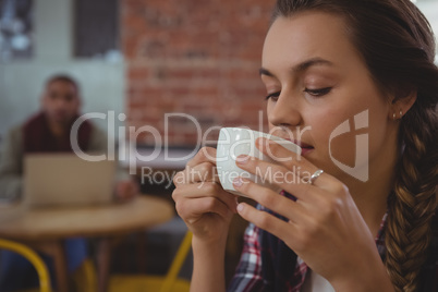 Woman drinking coffee