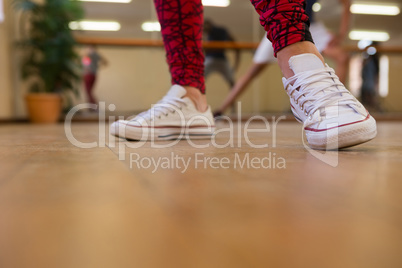 Low section of woman dancing on floor