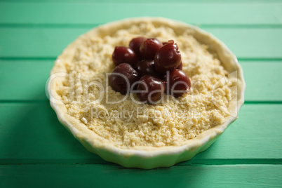 High angle view of olives on food in tart