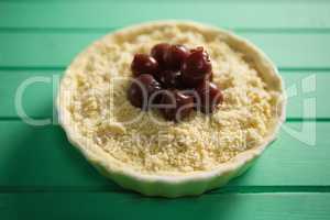 High angle view of olives on food in tart